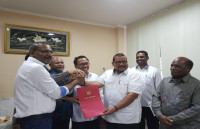 KPU Tandatangani NPHD Pilgub Papua Dengan Catatan